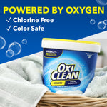 OxiClean tub in a wicker basket on a towel with 'Powered by Oxygen' and checkmarks for chlorine free and color safe