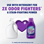 Promotional graphic showing OxiClean bottle next to a detergent jug with headline about 2x odor fighters and stain-fighting power