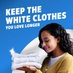 Woman holding a small stack of folded white clothes with headline 'Keep the white clothes you love longer' on a blue background