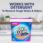OxiClean Odor Blasters tub on a countertop with headline "Works With Detergent" in the background