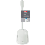 OXO branded compact toilet brush and canister with retail hang tag attached, shown on white background.