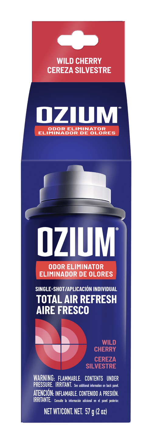 Product hang-tab box showing OZIUM branding with 'Wild Cherry / Cereza Silvestre' label and aerosol top illustration