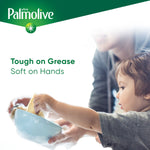 Lifestyle image of a child and adult washing a bowl with soap suds alongside Palmolive branding and text about being soft on hands