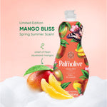 Palmolive Mango Bliss limited edition bottle beside fresh mango slices and promotional scent text