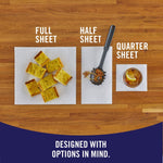Three paper towel sheets on wood surface labeled full, half and quarter sheet showing usage options