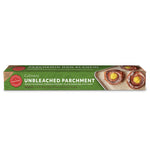 PaperChef unbleached parchment roll in its green branded box with a baking sheet of pastries pictured
