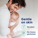 Lifestyle image of a smiling adult holding a baby with text stating gentle on skin, no dyes and no heavy perfumes.