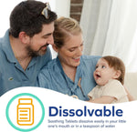 Smiling parents looking at a baby in their lap with a graphic overlay emphasizing dissolvable tablet benefit and icon