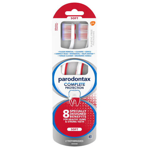 Parodontax Complete Protection toothbrushes in retail blister card showing two soft-headed brushes and brand logo