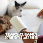 Close-up of a person peeling a sheet from a lint roller with a blurred dog in the background and text about tearing cleanly.