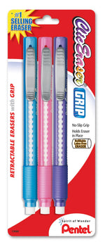 Close-up of three Pentel Clic Eraser Grip retractable erasers in blue, pink, and purple fashion barrels on retail backing.