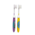 Two Peppa Pig toothbrushes standing upright showing side profiles and bristle heads, purple and yellow handles visible.