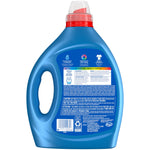 Rear view of a blue Persil laundry detergent bottle showing instructions, caution text, barcode and recycling icons on the label