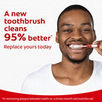 Smiling person brushing teeth with a red Colgate toothbrush alongside text stating a new toothbrush cleans 95% better