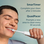 Lifestyle-style image of a person brushing with a Sonicare toothbrush beside text highlighting SmarTimer and QuadPacer features.