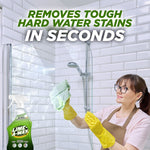 Person wearing yellow gloves cleaning a glass shower door with Lime-A-Way bottle visible and headline text