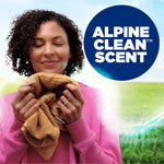 Person enjoying the scent of a towel with a large graphic reading ‘ALPINE CLEAN SCENT’ beside them