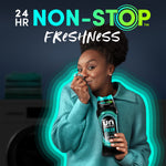 Person holding a Downy Unstopables Fresh bottle and smelling fabric with bold "NON-STOP" branding above