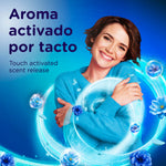 Smiling person hugging a blue sweater with swirling blue scent graphics and text about touch activated scent release