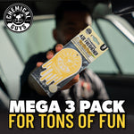 Person in car holding a packaged Chemical Guys Vanilla Bean hanging air freshener with brand logo and promotional text overlay