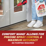 Lifestyle shot of person holding Ortho Home Defense jug and using the red comfort wand to spray near a door threshold