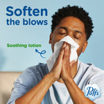 Person holding a tissue to their nose with text 'Soften the blows' and arrow pointing to 'soothing lotion'
