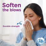 Person holding a tissue to their nose with purple 'Soften the blows' headline and the Puffs logo in the corner