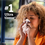 Person wiping their nose with a thick white tissue and on-image text labeling it #1 Ultra tissue