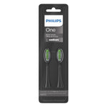Black blister pack showing two Philips One by Sonicare black replacement brush heads with visible Philips branding.