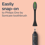 Black Philips One brush head shown above a matching handle with text saying it easily snap-ons to the toothbrush.