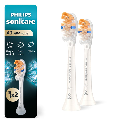 Two white Philips Sonicare A3 electric toothbrush replacement heads shown next to branded packaging with product icons and 1x2 callout.