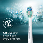 Single Philips Sonicare C2 brush head against a teal watery background with replace-every-3-months text