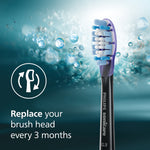 Single black Philips Sonicare G3 brush head against a teal background with replace-every-3-months text