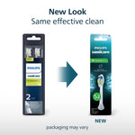 Graphic showing old and new Philips Sonicare brush head packaging with arrow and text 'New Look Same effective clean'.