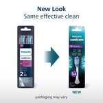 Graphic showing old and new Philips Sonicare packaging side by side with text 'New Look same effective clean' and packaging may vary note