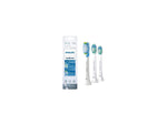 Philips Sonicare retail blister package pictured alongside three loose replacement brush heads on white.