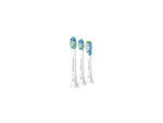 Three Philips Sonicare replacement brush heads grouped together, each with distinct bristle patterns.