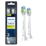 Two white Philips Sonicare W DiamondClean replacement brush heads beside their retail blister pack on a white background.