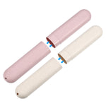Two speckled toothbrush travel cases, pink and beige, shown partially separated with blue arrows indicating how the halves join.