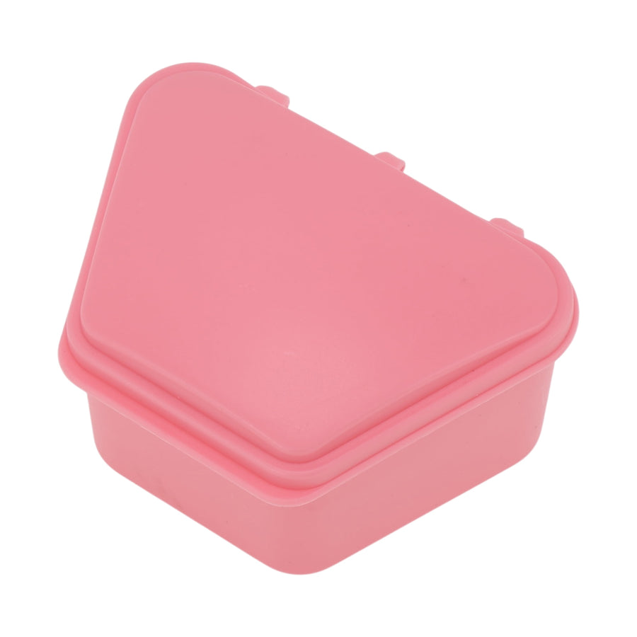 Triangular pink plastic retainer case closed, simple smooth lid and rounded corners