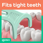 Close-up illustration of a mint-colored Plackers floss pick engaging between molars with ‘fits tight teeth’ label