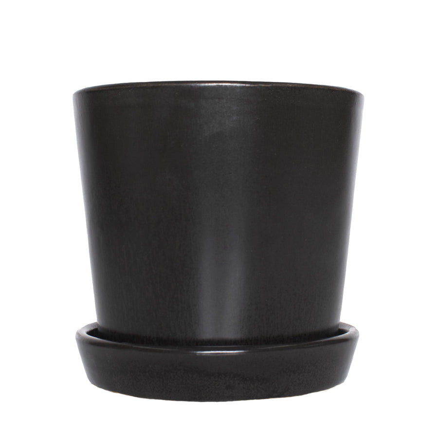 Semi-matte black ceramic plant container with matching saucer, front view on white background.