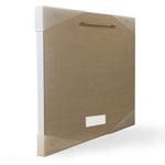 Rear view of a framed wood plaque showing brown backing board, pre-cut hanging slot and cardboard corner protectors