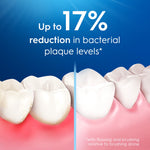 Graphic showing teeth before and after flossing with text claiming up to 17% reduction in bacterial plaque levels