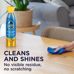 Pledge multisurface cleaner bottle with a hand wiping a wooden table, promoting no visible residue and no scratching