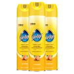 Three yellow Pledge Expert Care orange-enhancing aerosol cans shown side-by-side on white background.