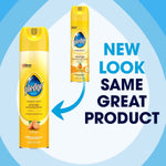 Two yellow Pledge aerosol cans displayed against blue concentric background with text 'NEW LOOK SAME GREAT PRODUCT'