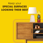 Styled interior shelf scene with Pledge wood oil can on a yellow background and copy about special surfaces looking their best.