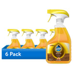 Six yellow‑topped Pledge wood oil trigger bottles arranged in a blue tray with one large bottle foreground