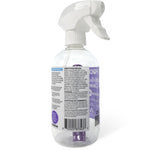 Rear view of a clear Podsy spray bottle showing the product barcode, directions panel and a purple refill pod inside